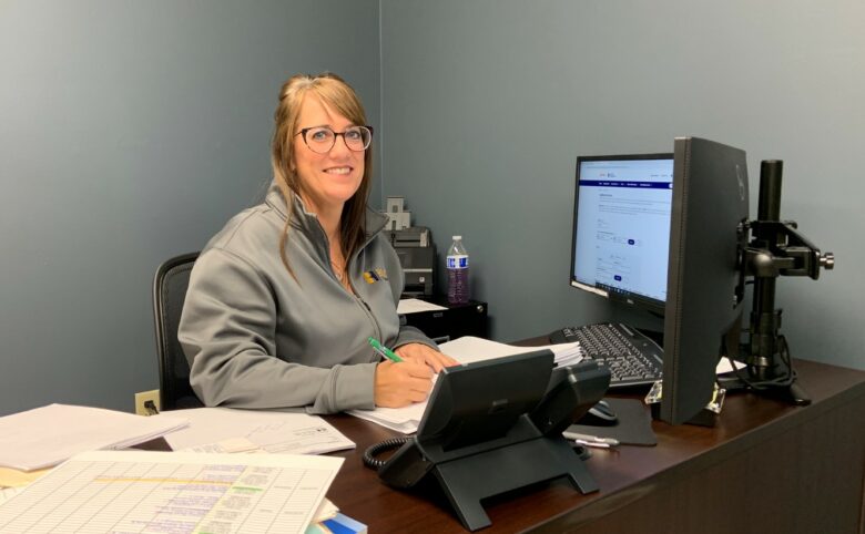 Independent Insurance Agent, Lori Good, sitting in her office near Monclova, OH